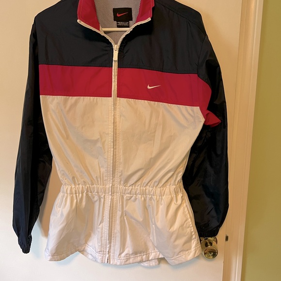 Nike rain jacket, size med, in navy, pink, and white, in good condition. - Picture 3 of 7